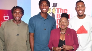 (from left) Antonio Watson, Roshawn Clarke, Minister of Sport Olivia Grange, and Great Britain&#039;s Zharnel Hughes share lens time.