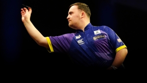 Luke Littler hits nine-dart finish in win over Michele Turetta in Wigan