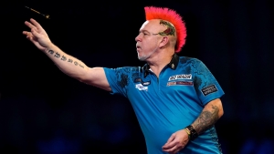 Peter Wright pulls off great escape to topple Krzysztof Ratajski in Amsterdam