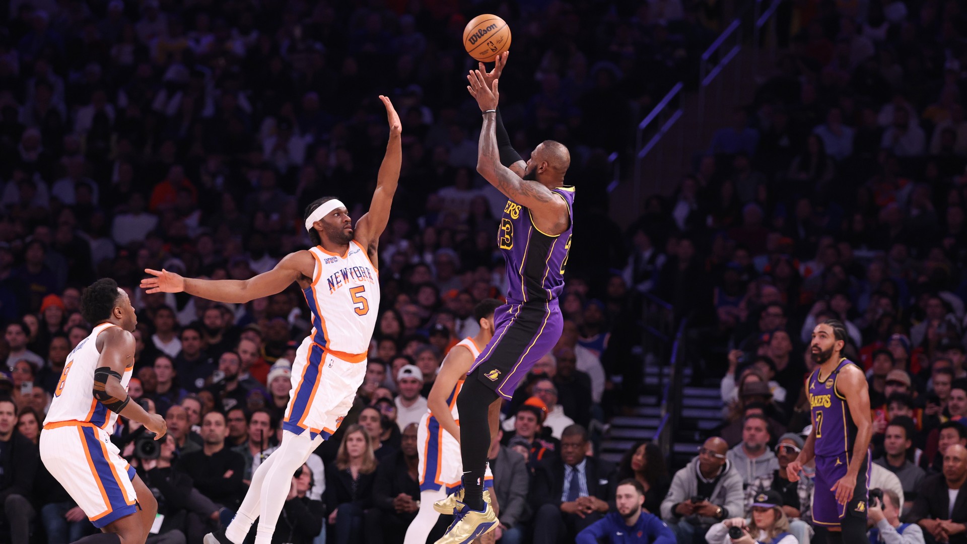 James has triple-double in win