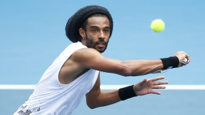 Coronavirus: Jamaican Dustin Brown serves up early win as tennis returns behind closed doors