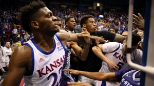 Four banned after Big 12 college basketball brawl