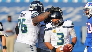 Russell Wilson tells Seahawks to 'figure out' fix for 'exceptional' holdout Duane Brown