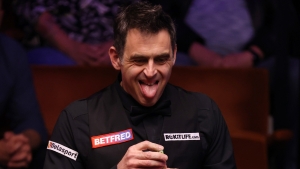 Reluctant Ronnie: Bashful O'Sullivan chases Crucible record set by 'Tiger Woods of snooker'