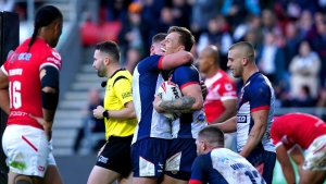 Tom Johnstone second-half brace helps England edge out Tonga in series opener