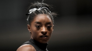 Simone Biles claims record eighth US crown on return