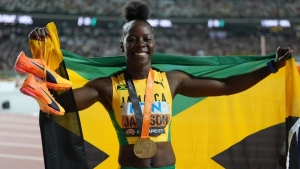 QUEEN OF THE 200m: Jamaica's Jackson shatters own championship record as she storms to gold in Budapest