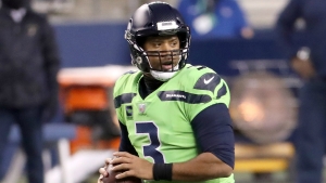 Seattle Seahawks' Carlos Dunlap on Russell Wilson: 'He told me he's with us  and he's here to stay' 