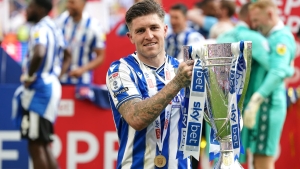 Josh Windass’ last-gasp winner against 10-man Barnsley earns Sheff Wed promotion