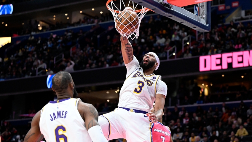 Los Angeles Lakers guard Russell Westbrook (0) dunks against the Washington  Wizards during the first half