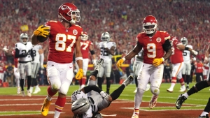 Travis Kelce&#039;s four touchdowns lead Chiefs to 30-29 win over the Raiders