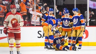 NHL: Oilers edge Flames for 13th straight victory