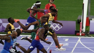 Lyles narrowly beats Thompson in nail-biting 100m final in Paris