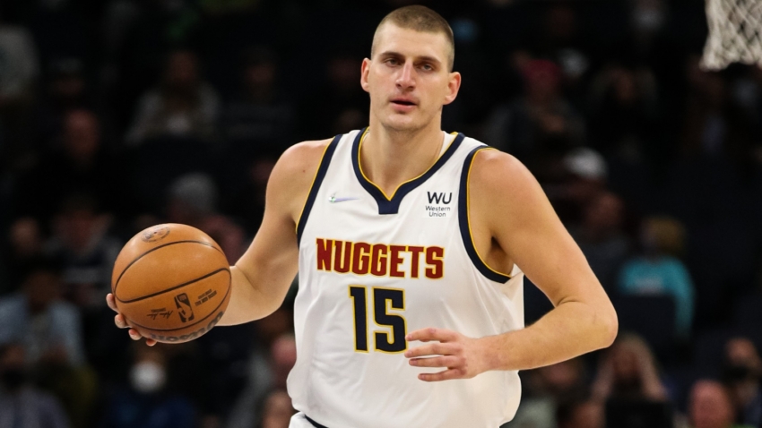 MVP Jokic leads Nuggets to OT win with another triple-double, Giannis struggles