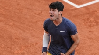 Alcaraz goes the distance to clinch French Open crown
