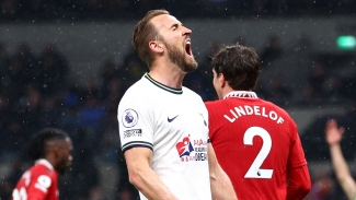 Harry Kane reacts to Man Utd chant as Spurs star says Levy talks were designed to avert late-season slide