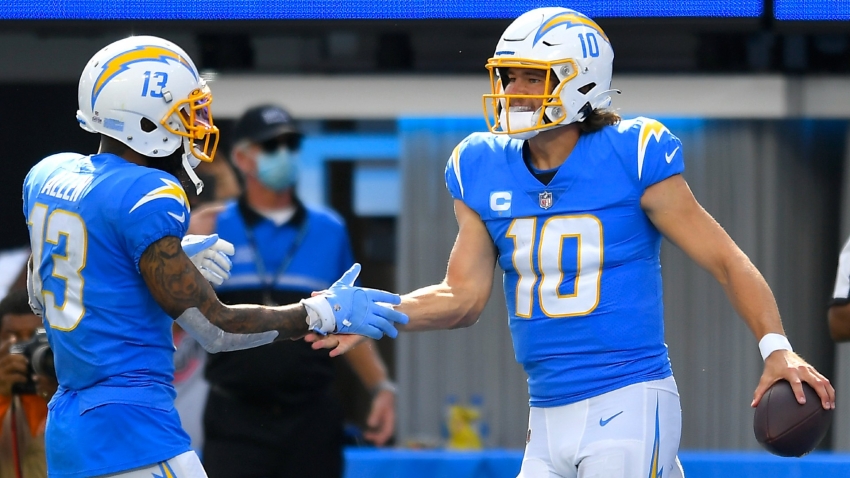 Herbert leads Chargers past Browns in high-scoring affair