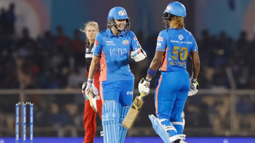 Hayley Matthews (right) and Nat Sciver-Brunt (left) produced a match-winning 114-run second wicket partnership for the Mumbai Indians.