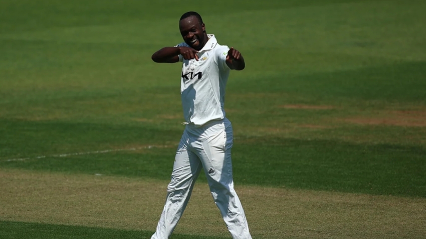 Kemar Roach celebrating a wicket for Surrey.