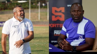 Mona&#039;s Head coach Craig Butler (left) and Vassell Reynolds of Kingston College.