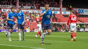 Peterborough book play-off place with victory at Barnsley