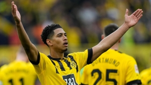 Jude Bellingham nets double as Borussia Dortmund keep up title pursuit