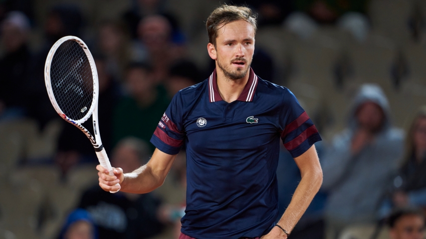 Medvedev battles into French Open second round after Koepfer triumph