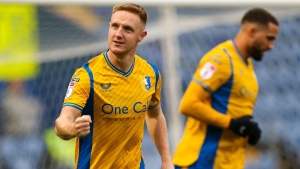 Mansfield crush 10-man Salford and take over at the top of League Two