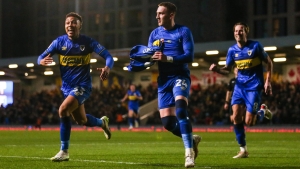 AFC Wimbledon leave it late as Ronan Curtis ends 10-man Mansfield’s resistance