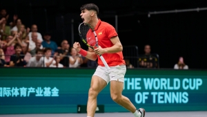 Alcaraz grinds through to help Spain to Davis Cup win