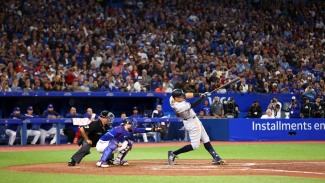 Judge makes history with 61st home run in Yankees win over Blue Jays, Escobar leads Mets walk-off