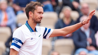 Medvedev moves into French Open third round after Kecmanovic retires injured
