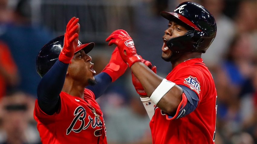 Braves rally past Giants in showdown of division leaders, Yankees dominate A&#039;s