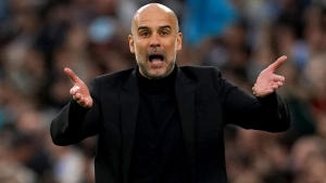 Pep Guardiola compares Man City’s title push to serving for Wimbledon glory