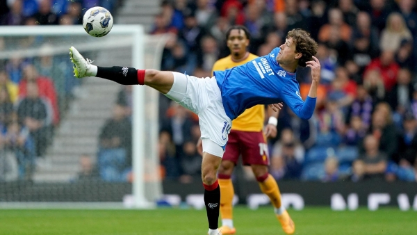 Rangers' Steven Whittaker is tackled by Motherwell's David