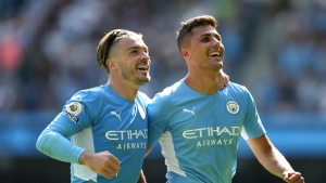 Manchester City 5-0 Arsenal: Guardiola&#039;s side inflict more misery on 10-man Gunners