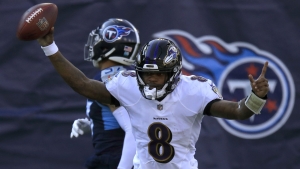 NFL playoffs: Lamar Jackson helps Ravens run past Titans in Tennessee