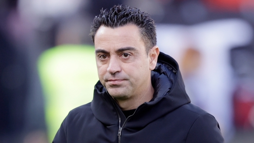 Xavi commits U-turn and elects to stay at Barcelona
