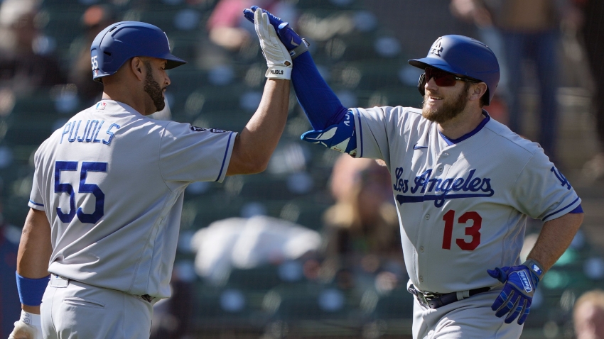 Rangers beat Dodgers 8-4 to avoid sweep; LA's Muncy hits grand