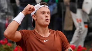 Medvedev makes his mark on clay by beating Rune for Italian Open title