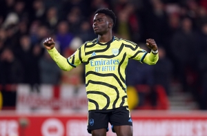 Elijah Adebayo’s hat-trick helps Luton to crushing win against Brighton