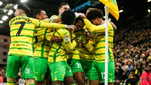 Norwich close in on the top six after sweeping aside Huddersfield