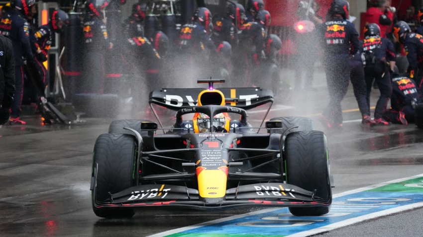 Verstappen victory enough for title after Leclerc penalty in rain-shortened race