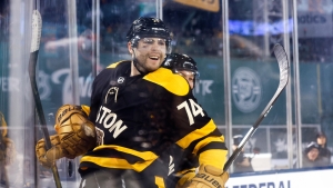 DeBrusk scores 2 in 3rd, Bruins beat Penguins in Winter Classic