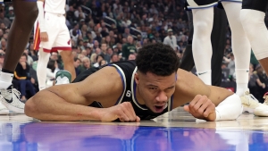 Giannis to miss Game 2 due to bruised lower back