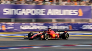 Ferrari duo set early Singapore pace as lizards disrupt first practice session