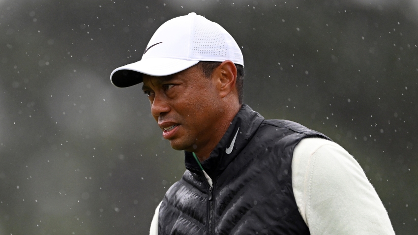The Masters: Tiger Woods makes cut and equals Augusta record as Rahm chases leader Koepka