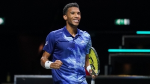 Reigning champion Auger-Aliassime leads seeds through in Rotterdam