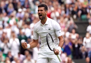 Wimbledon day nine: Iga Swiatek sent home but Novak Djokovic marches on