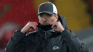 Klopp brushes away title talk but wants Liverpool to make Anfield a fortress again
